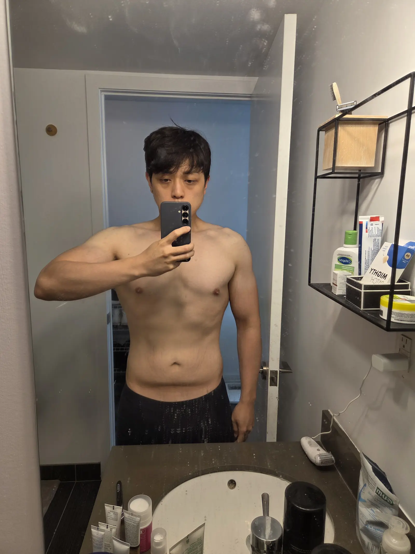 Founder mid-plateau portrait, calmly reading the graph, the visual anchor for why did I stop losing weight at 3 months