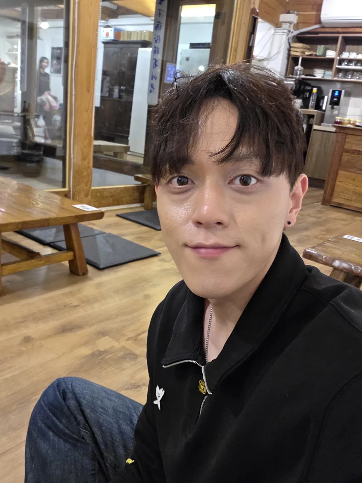 Founder portrait inside a hanok cafe